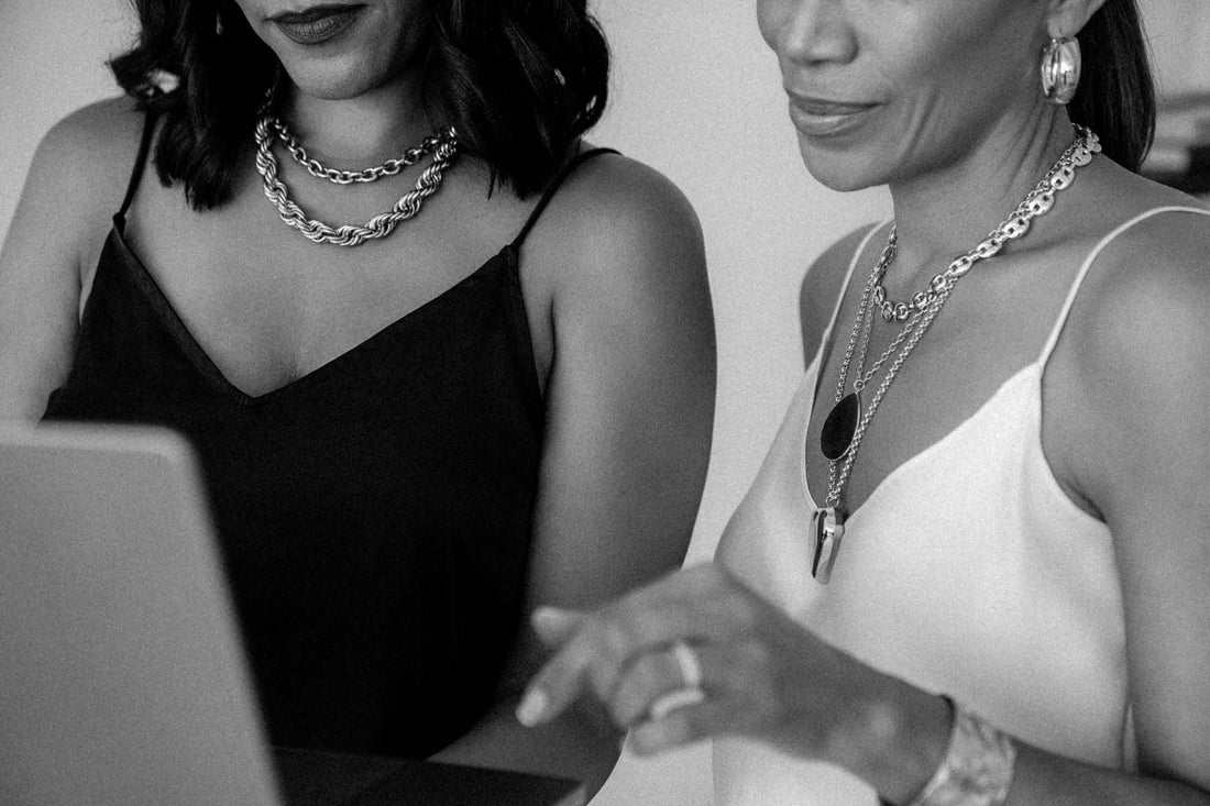 two best friends looking at screen