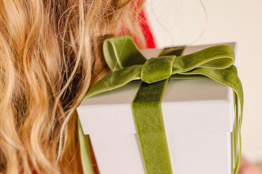 woman holding gift boxes